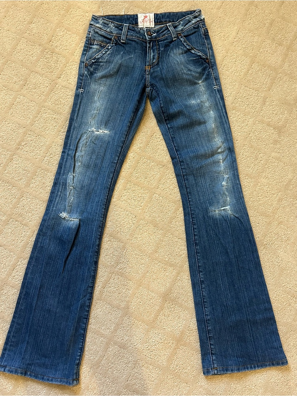 Levi's Dark Blue Flare Jeans with Distressed Accents